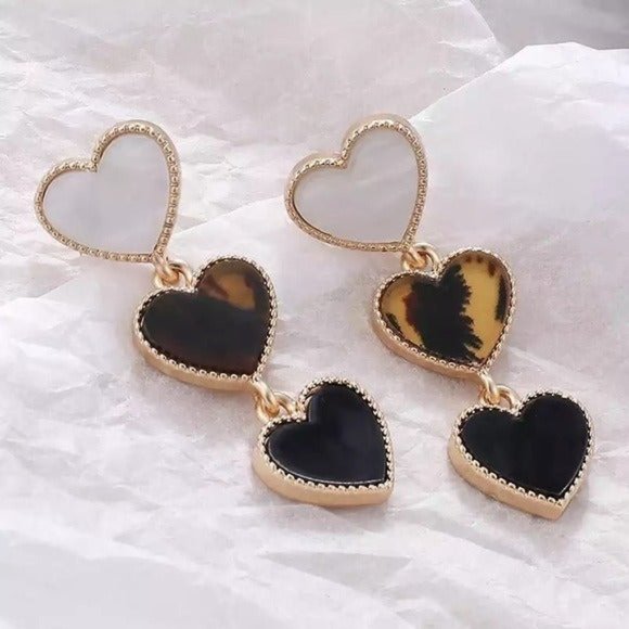 Free People Jewelry - Triple hearts animal print earrings